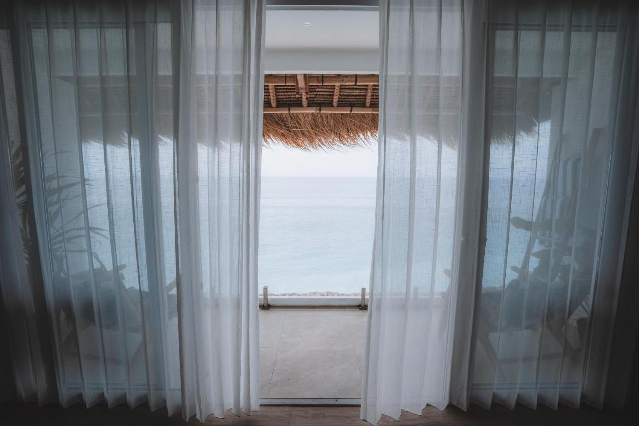 Legends Beachfront Resort Uluwatu Extérieur photo