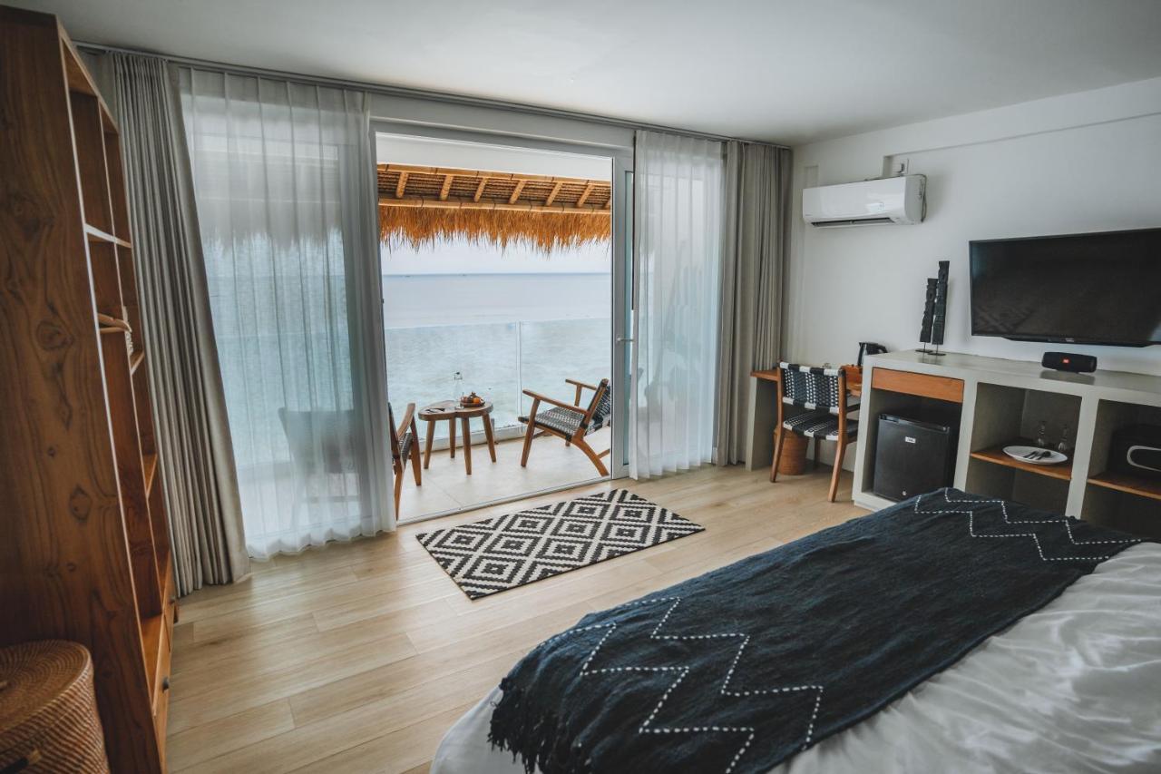 Legends Beachfront Resort Uluwatu Extérieur photo